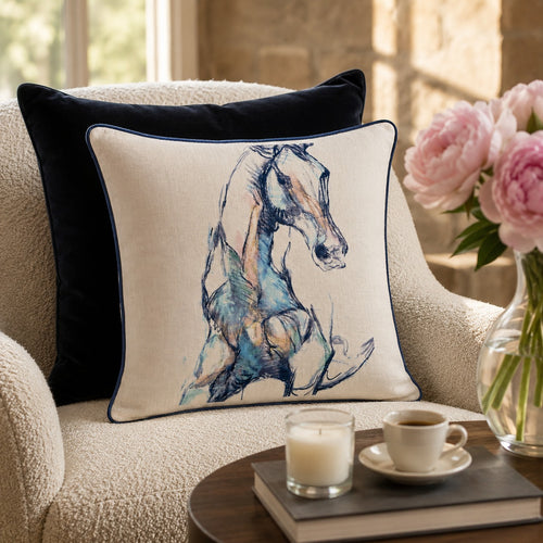 Arabian Horse Cushion styled on an armchair beside pink peonies