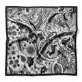 Noir Paisley silk bandana — black-and-white jacobean paisley with black border, flat catalogue