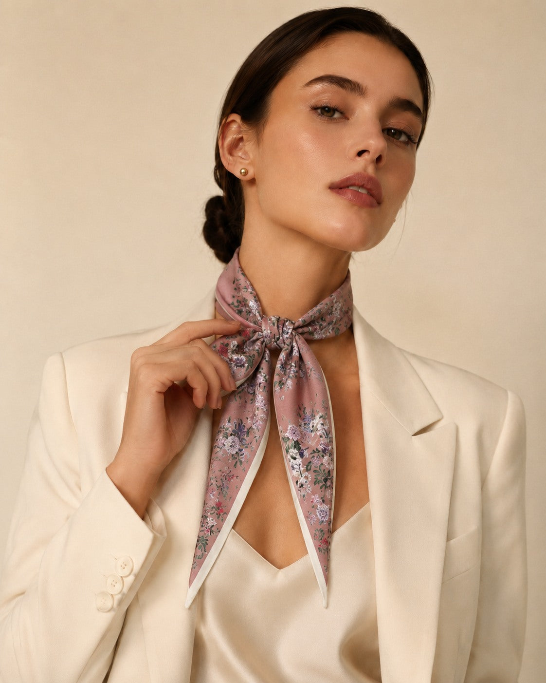 Model wearing the Rose belting scarf tied at the neck