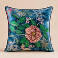 Blue Scooter Cushion — blush peony and white line-drawn scooters on indigo velvet with navy piping
