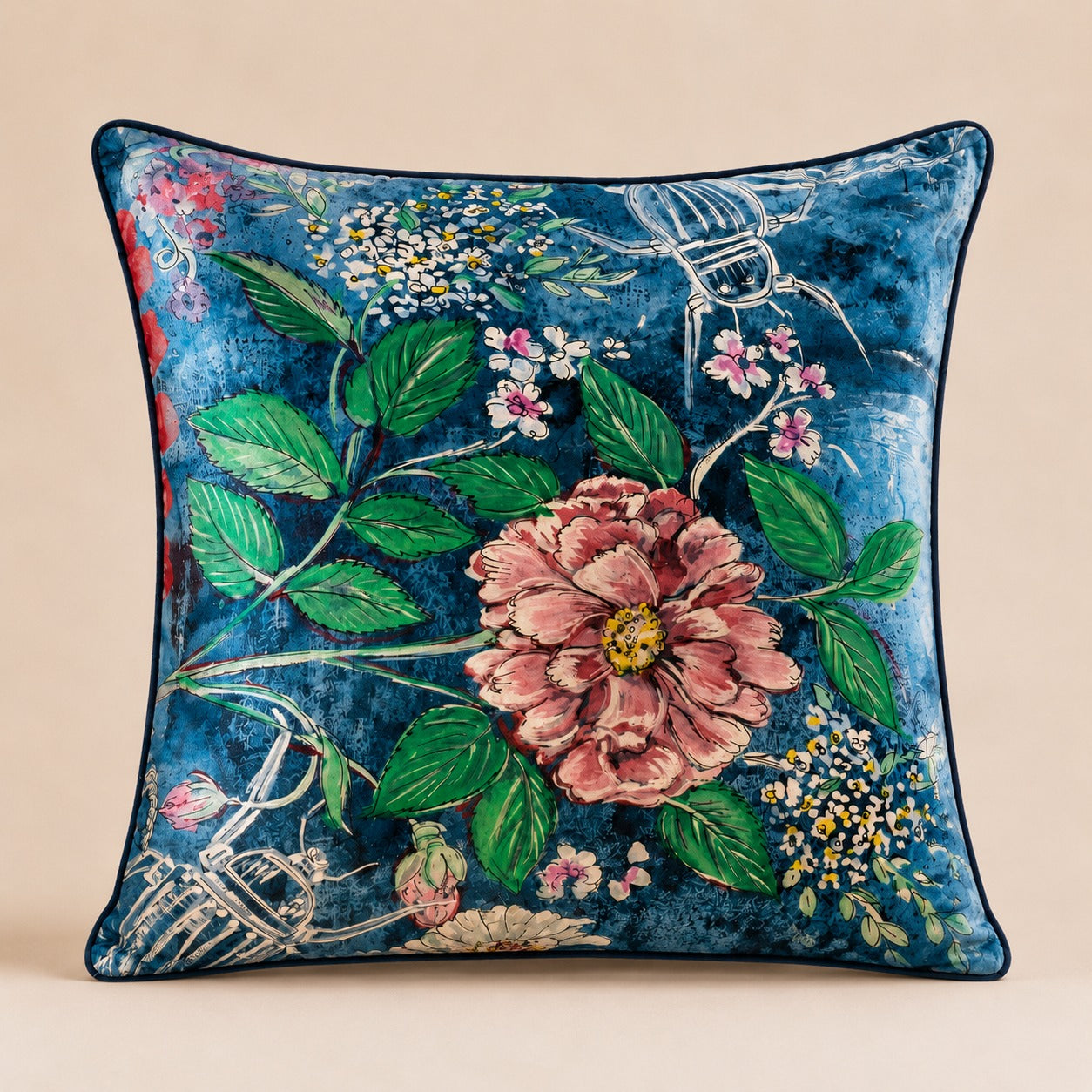 Blue Scooter Cushion — blush peony and white line-drawn scooters on indigo velvet with navy piping
