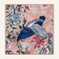 Heron Blossom silk scarf, 40x40 — hand-painted blue heron and blossoms on rose pink, satin flat lay