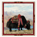 Highland Yak silk scarf, 40x40 — ceremonial yak in a mountain landscape with carmine bridle border, satin flat lay
