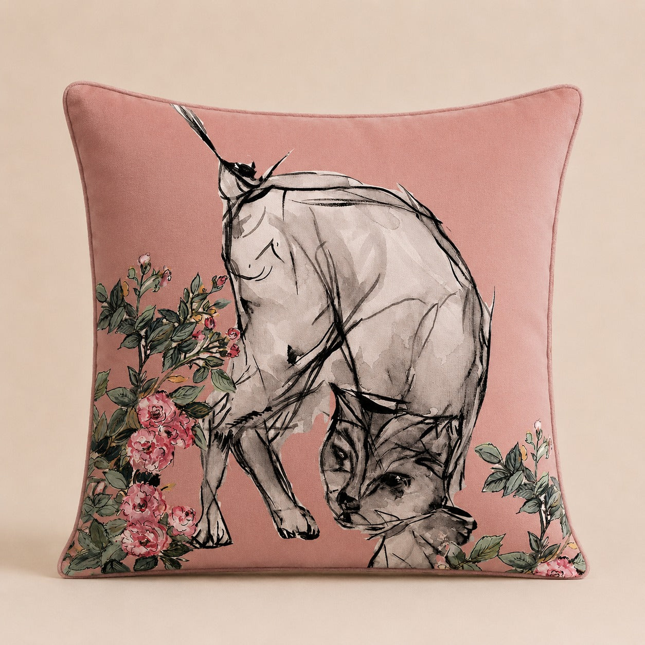 Ink Cat Cushion — grey ink-and-wash cat among pink roses on dusty-rose velvet