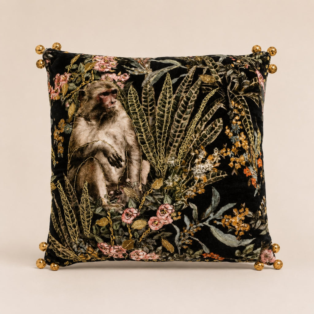 Macaque Botanical Cushion — monkey among gilded ferns and roses on black velvet with gold bead corners