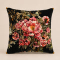 Midnight Rose Cushion — blush roses with gold embroidery on black velvet, gold pom corners