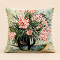 Willow cushion — pink and white blooms in a painted jug on pale teal with ivory pom-poms, flat catalogue