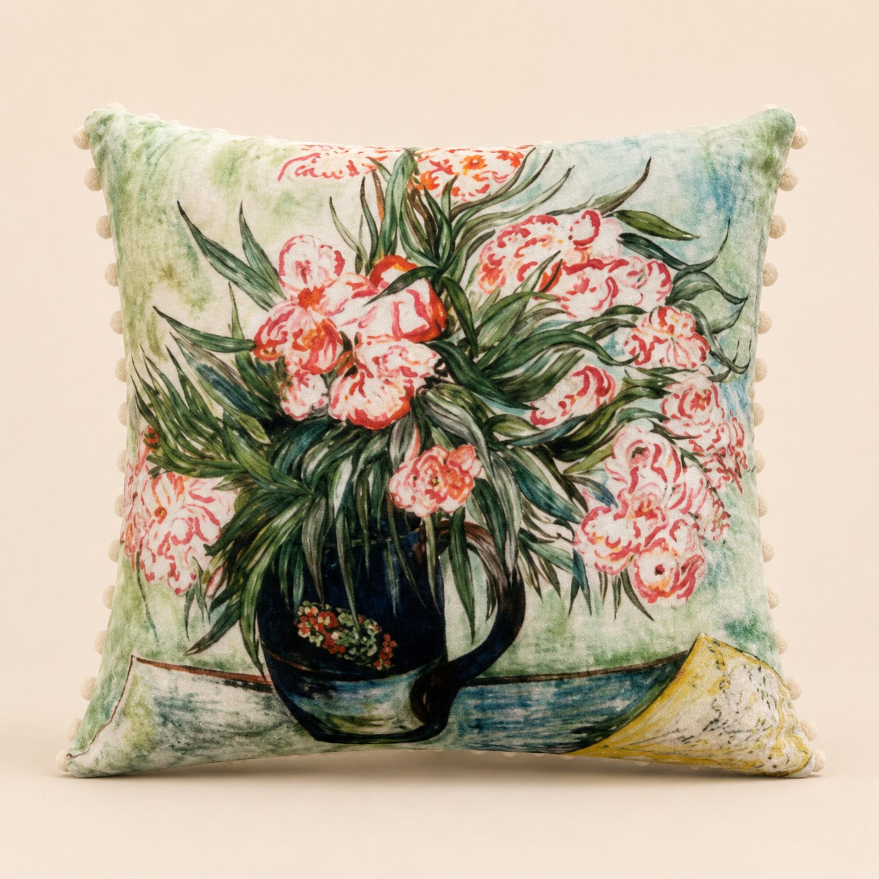 Willow cushion — pink and white blooms in a painted jug on pale teal with ivory pom-poms, flat catalogue
